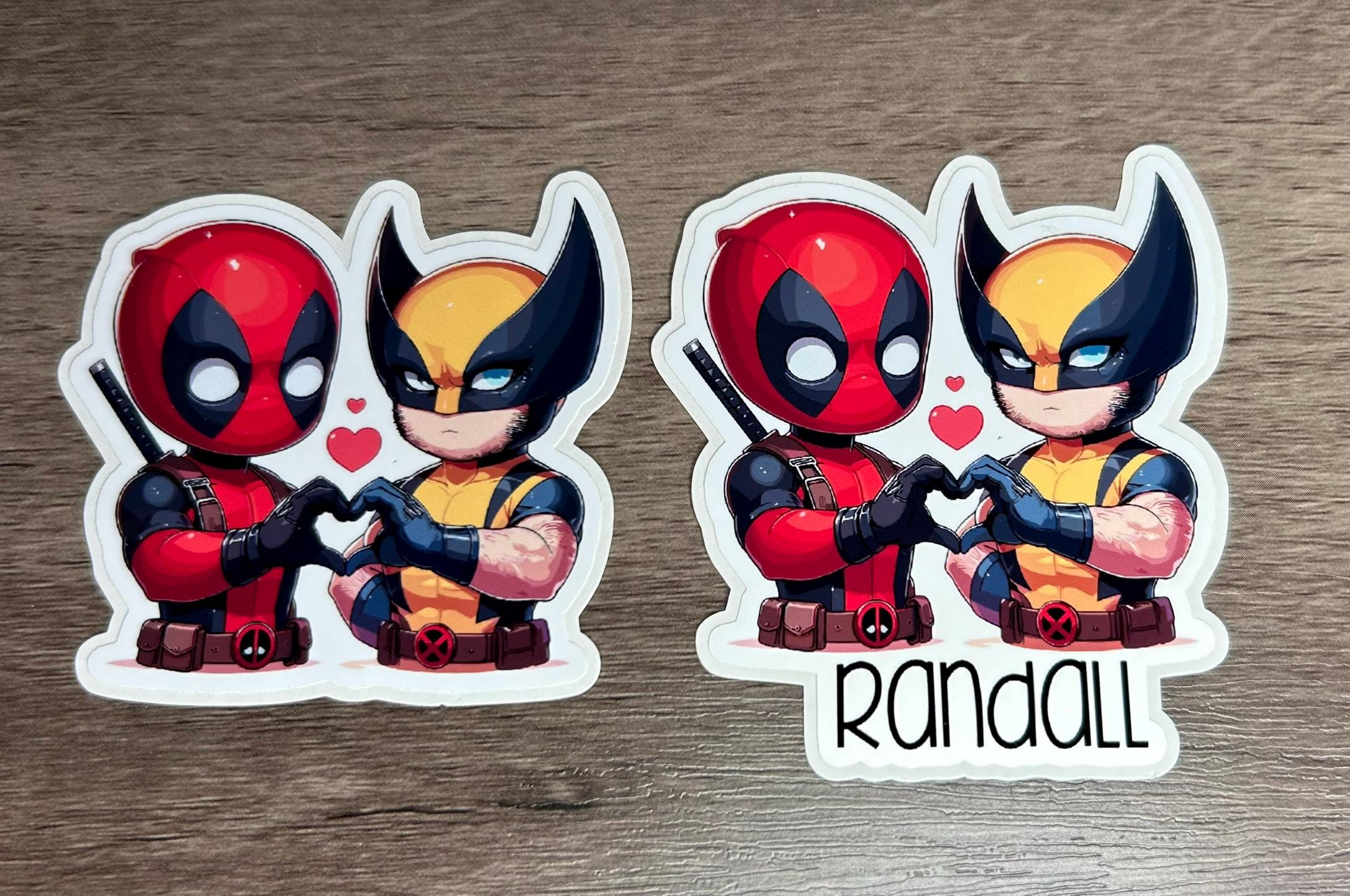 CHIBI DEADPOOL & WOLVERINE HEART STICKER